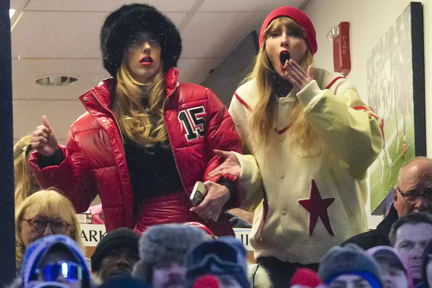 Taylor Swift and Brittany Mahomes watch the Chiefs-Bills playoff game. AP PHOTO/FRANK FRANKLIN II